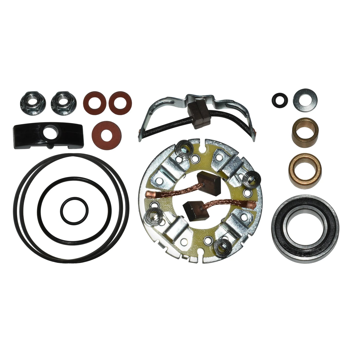 assorted mechanical repair parts including metal brushes, O-rings, washers, nuts, and a bearing laid out on white background