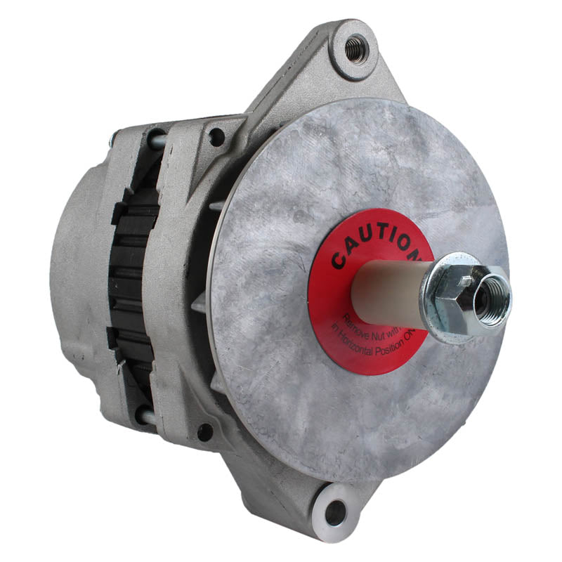 Close-up of a silver automotive alternator with a red caution label on the pulley and a central bolt