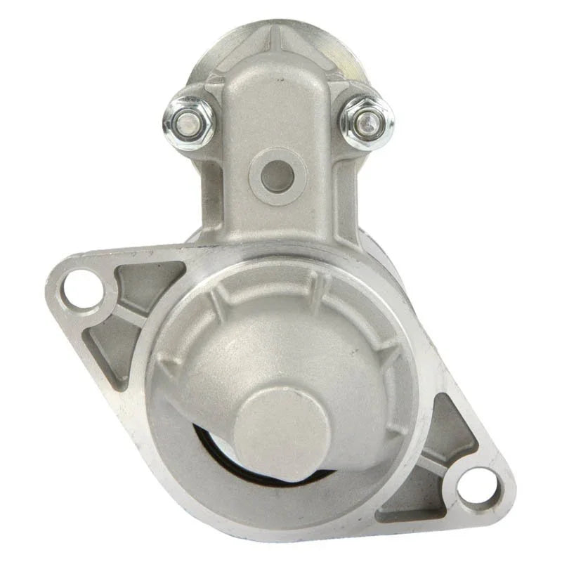 Close-up of silver Kubota RTV 500 starter motor with mounting holes and bolts on white background