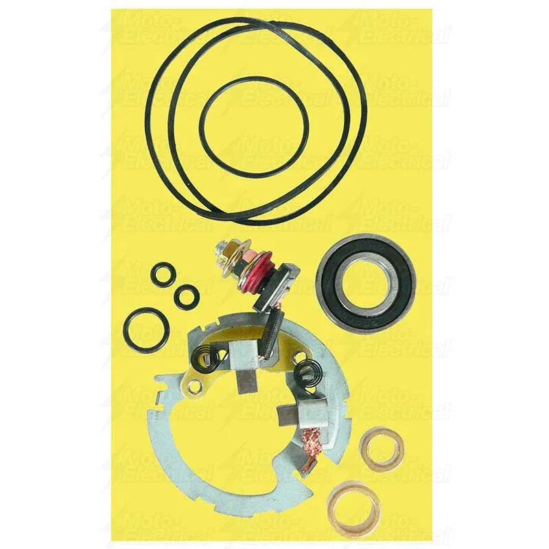 Polaris ATV starter brush kit with brushes, springs, seals, washers, and O-rings on yellow background