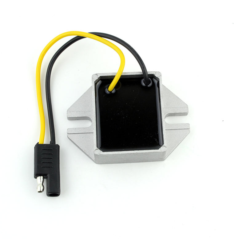silver and black electronic voltage regulator with yellow and black wires on white background
