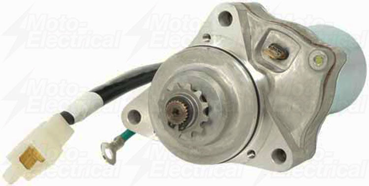 Silver motorcycle starter motor with gear and electrical connector cable on white background