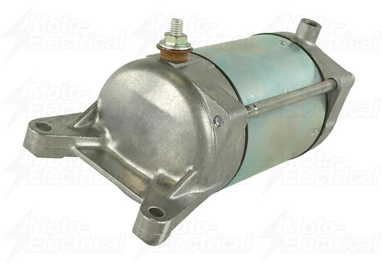 silver automotive starter motor with mounting holes and electrical terminal on white background