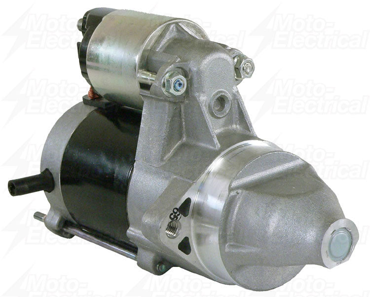 Close-up of metallic automotive starter motor with black cylindrical body and mounting bolts
