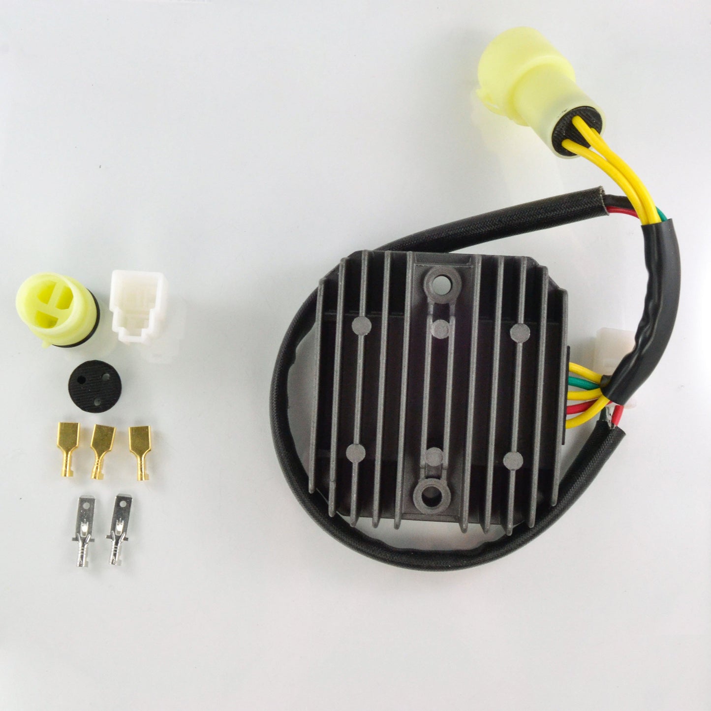 Black voltage regulator rectifier with yellow and green wires, plus connectors and terminals on white background