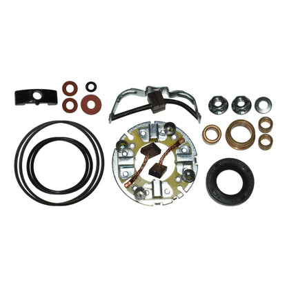 Assorted mechanical and electrical parts including rubber O-rings, washers, nuts, brushes, and metal components