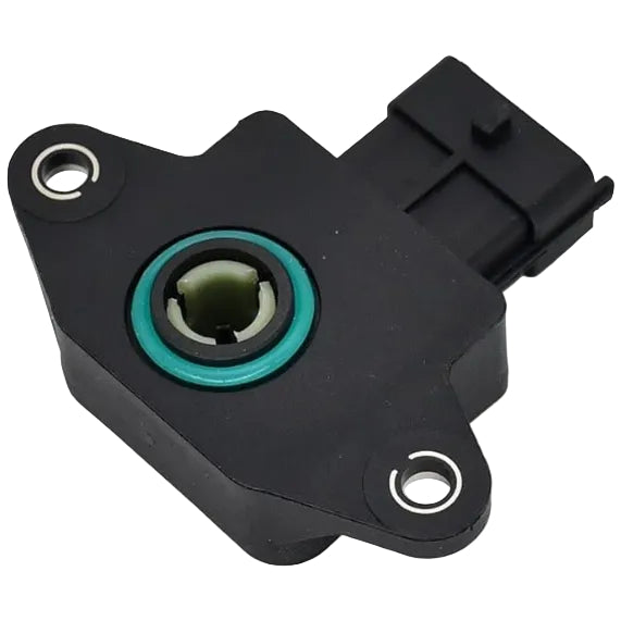 Black automotive sensor with green center on a white background
