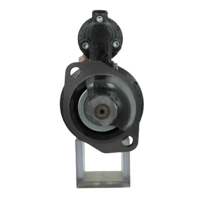 Black mechanical component on a white background