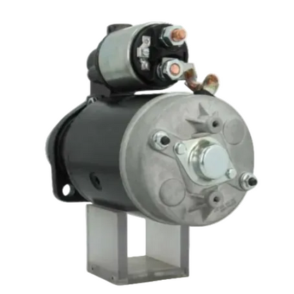 Car starter motor on a white background