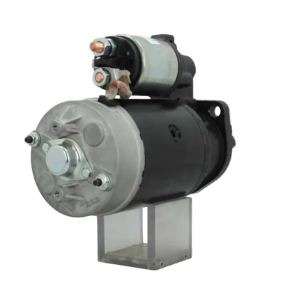 Car starter motor on a white background