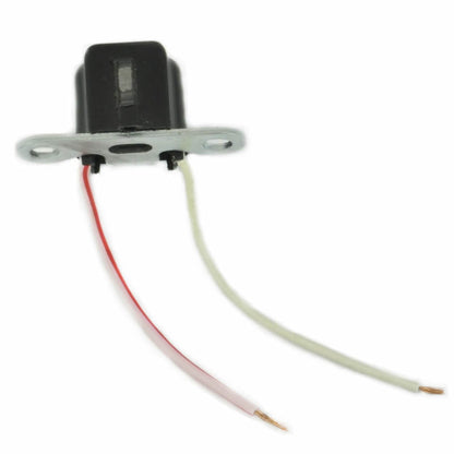 Black electronic sensor component with metal mounting plate and red and white wires