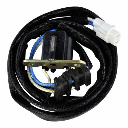 Coiled black automotive wiring harness with blue, white wires and white plastic connector