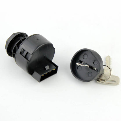 Black ignition switch cylinder with key on a white background, automotive electrical part